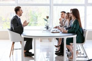 human-resources-commission-interviewing-man-office_392895-19083